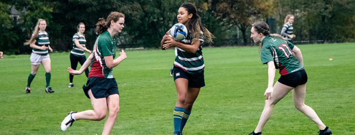 A photo of the Leeds University Women's Rugby team playing a game