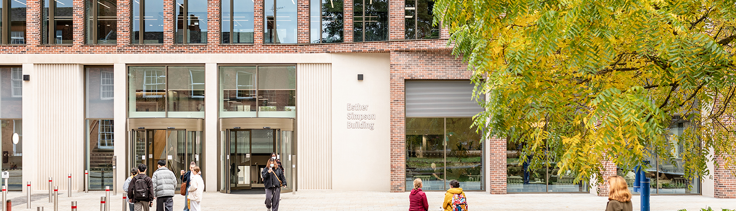 Esther Simpson exterior with two students outside