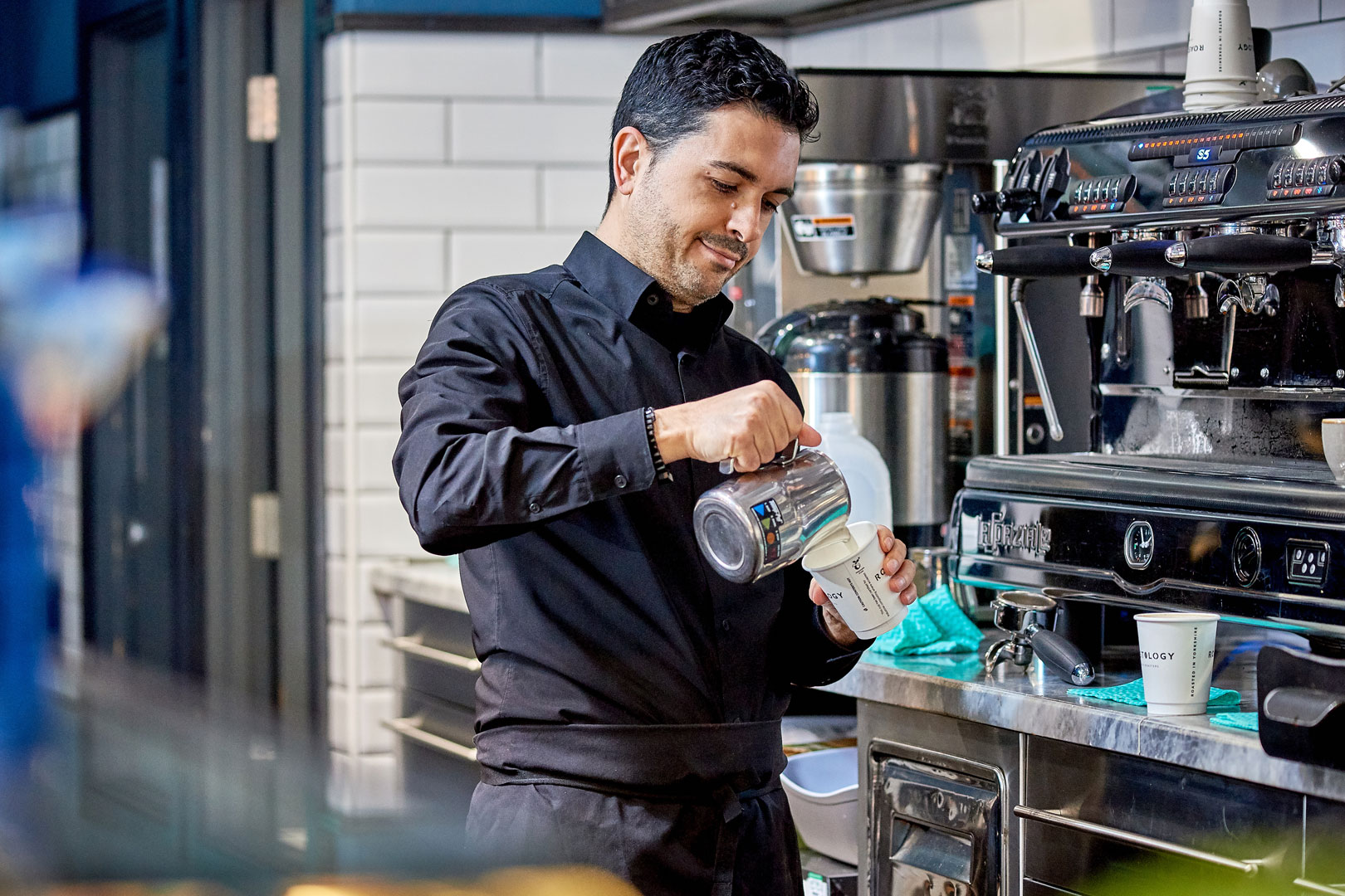 Barista making coffee