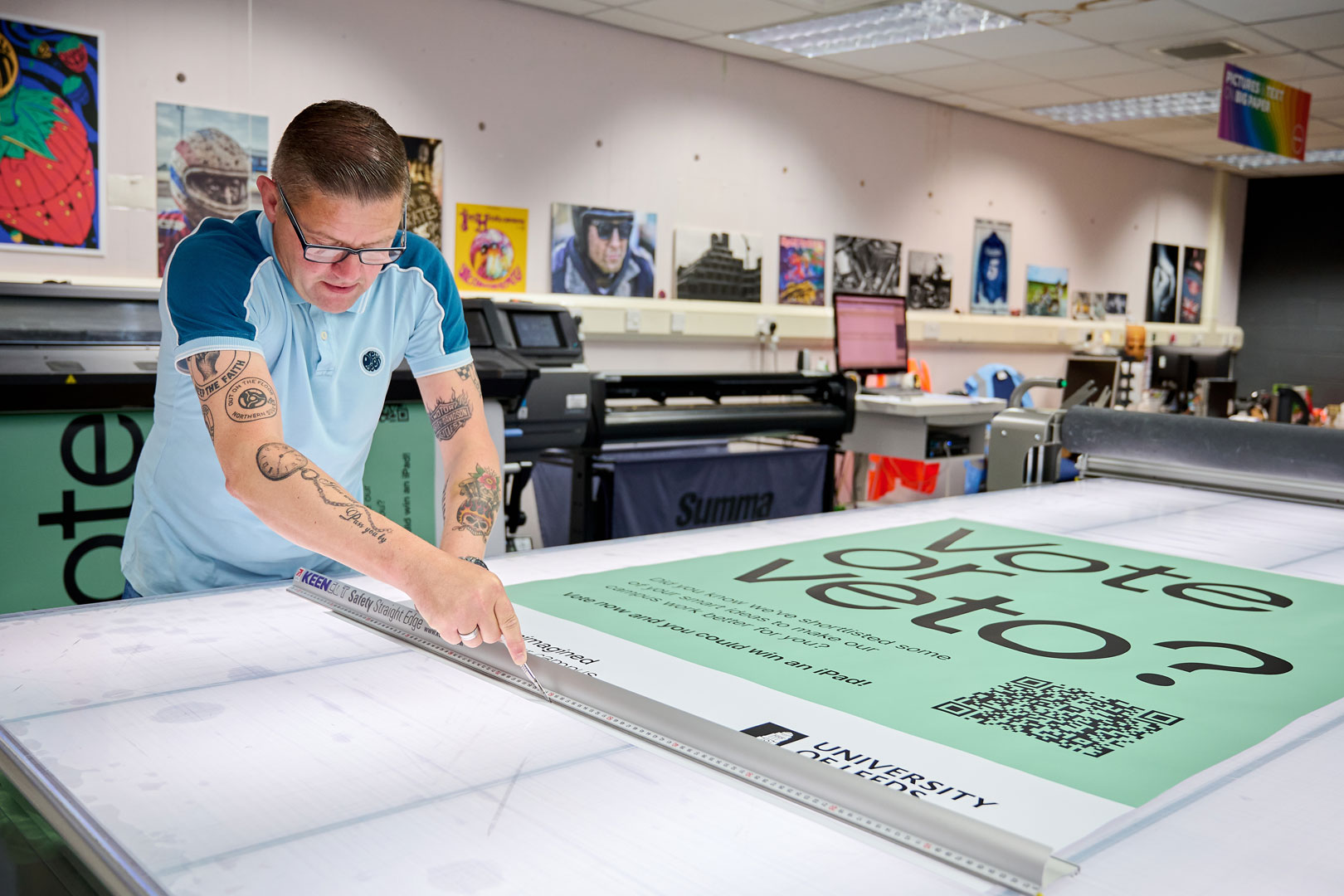 Colleague printing a poster